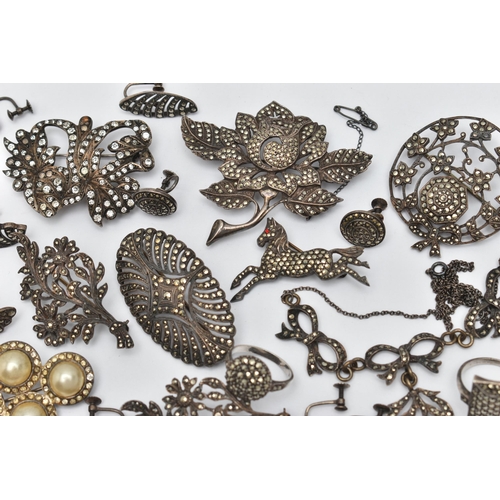 62 - AN ASSORTMENT OF WHITE METAL AND MARCASITE MID CENTURY JEWELLERY, to include six brooches, two rings... 