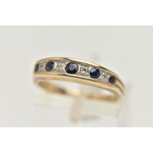 7 - A 9CT GOLD SAPPHIRE AND DIAMOND HALF ETERNITY RING, designed with a row of five graduated circular c... 