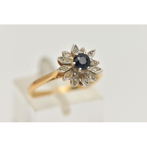 8 - AN 18CT YELLOW GOLD CLUSTER RING, flower shape cluster set with a raised circular cut deep blue sapp... 