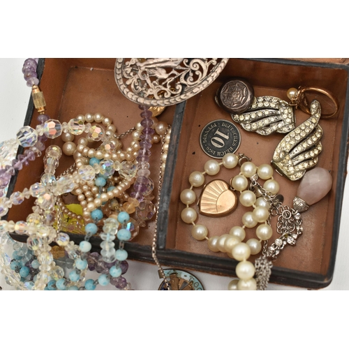 102 - A SMALL ASSORTMENT OF JEWELLERY, a double compartment leather box, encasing a small selection of bea... 