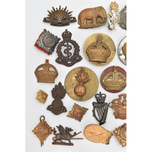 103 - AN ASSORTMENT OF CAP BADGES, a selection of cap badges and pins from various military regiments