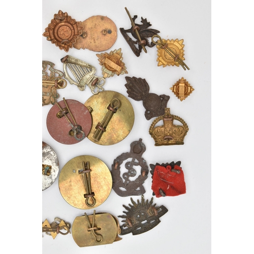 103 - AN ASSORTMENT OF CAP BADGES, a selection of cap badges and pins from various military regiments