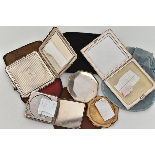 127 - TWO SILVER POWDER COMPACTS AND TWO STRATTON PLATED POWDER COMPACTS, the silver compacts comprising a... 