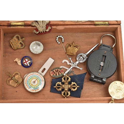 128 - A BOX AND A WOODEN BOX OF MILITARY BADGES, OTHER METAL AND ENAMEL BADGES, NEEDLEWORK ACCESSORIES AND... 