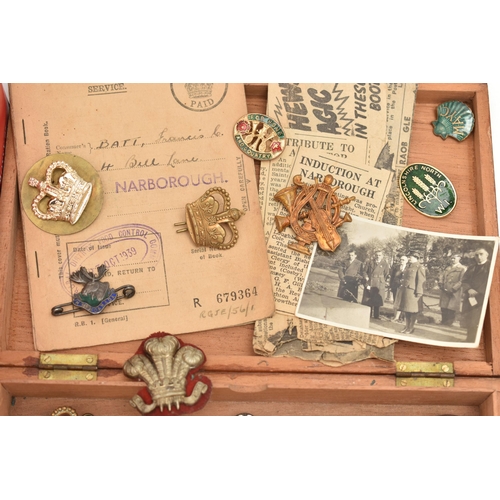 128 - A BOX AND A WOODEN BOX OF MILITARY BADGES, OTHER METAL AND ENAMEL BADGES, NEEDLEWORK ACCESSORIES AND... 