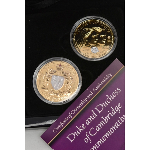 144 - A DUKE AND DUCHESS OF CAMBRIDGE COMMEMORATIVE SET, gold layered pair of £5 2011 for Tristaqnda Cunha... 