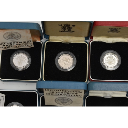 154 - A CARDBOARD BOX CONTAINING 26x SILVER PROOF ROYAL MINT ONE POUND COINS, 1983-97 thirteen are boxed o... 