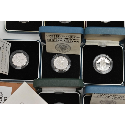 154 - A CARDBOARD BOX CONTAINING 26x SILVER PROOF ROYAL MINT ONE POUND COINS, 1983-97 thirteen are boxed o... 