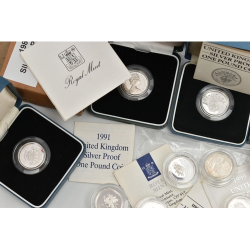 154 - A CARDBOARD BOX CONTAINING 26x SILVER PROOF ROYAL MINT ONE POUND COINS, 1983-97 thirteen are boxed o... 