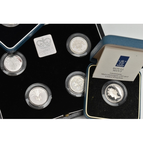 154 - A CARDBOARD BOX CONTAINING 26x SILVER PROOF ROYAL MINT ONE POUND COINS, 1983-97 thirteen are boxed o... 