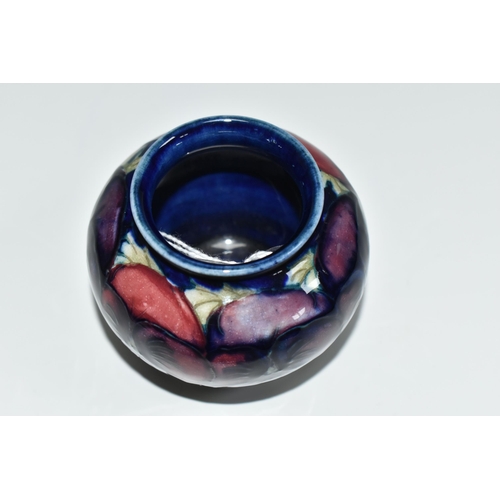 308 - A MOORCROFT POTTERY 'BLUE PANSY' PATTERN SMALL BULBOUS VASE, purple and blue pansies on a dark blue ... 