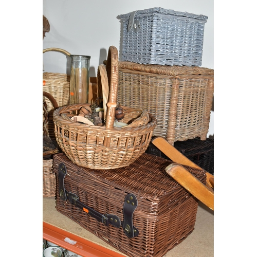 315 - A QUANTITY OF WICKER BASKETS, HAMPERS, CHAIR AND A WOODEN ROCKING HORSE, comprising a child's small ... 