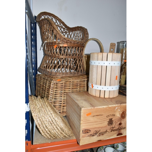 315 - A QUANTITY OF WICKER BASKETS, HAMPERS, CHAIR AND A WOODEN ROCKING HORSE, comprising a child's small ... 