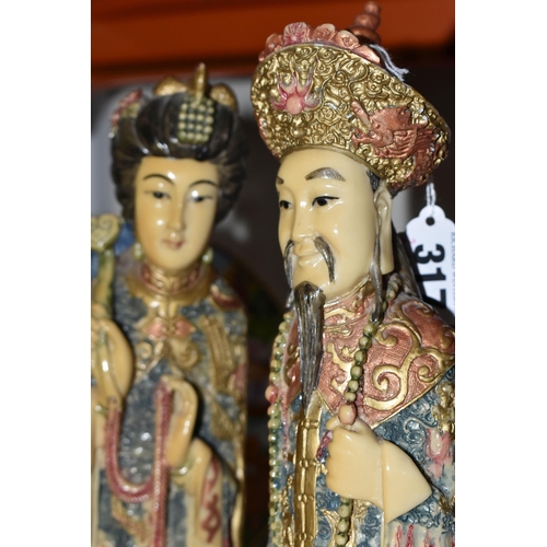 317 - A GROUP OF COLLECTOR'S PLATES AND A PAIR OF CHINESE FIGURES, comprising a pair of male and female re... 