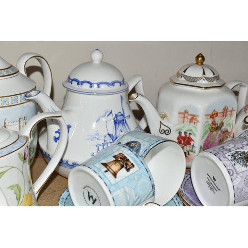 320 - A GROUP OF WEDGWOOD AND ROYAL DOULTON COFFEE CUPS AND FIVE COMPTON AND WOODHOUSE TEAPOTS, 'The First... 