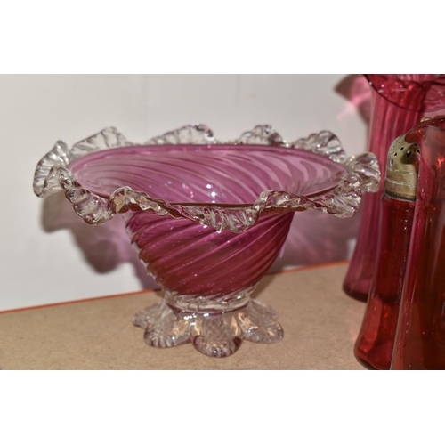 321 - A GROUP OF CRANBERRY GLASS, comprising three frilled edge bowls, a small basket, tumbler (chipped), ... 