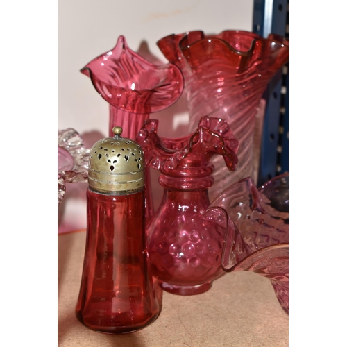 321 - A GROUP OF CRANBERRY GLASS, comprising three frilled edge bowls, a small basket, tumbler (chipped), ... 