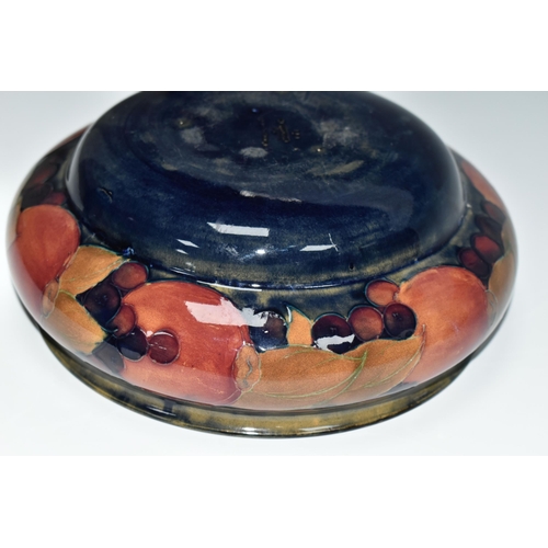 322 - A MOORCROFT POTTERY POMEGRANATE BOWL, decorated with pomegranates on a mottled blue ground, impresse... 