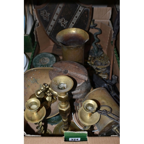 324 - ONE BOX OF METALWARE, to include three brass candle sticks, a shield shaped fireside companion set, ... 