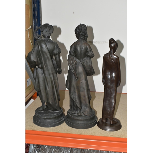 329 - THREE BRONZED FIGURINES, comprising a pair of spelter figurines of a young man and woman (possibly R... 