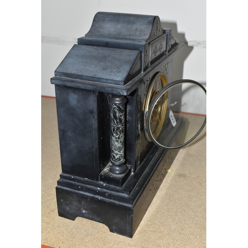 331 - A BLACK SLATE VICTORIAN MANTEL CLOCK, a late Victorian large black slate cased mantel clock of archi... 