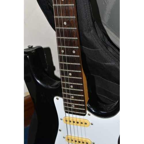 344 - AN ENCORE COASTER STRATOCASTER STYLE ELECTRIC GUITAR, with a black finish, maple neck and tremolo, t... 