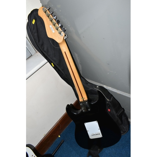 344 - AN ENCORE COASTER STRATOCASTER STYLE ELECTRIC GUITAR, with a black finish, maple neck and tremolo, t... 