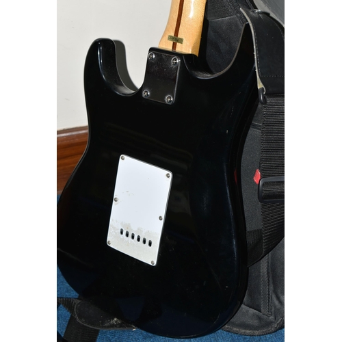 344 - AN ENCORE COASTER STRATOCASTER STYLE ELECTRIC GUITAR, with a black finish, maple neck and tremolo, t... 