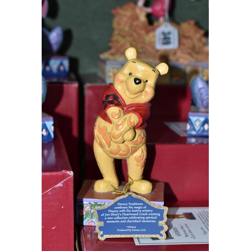 349 - FIVE BOXED ENESCO DISNEY SHOWCASE 'WINNIE THE POOH' FIGURES, from Disney Traditions by Jim Shore, co... 