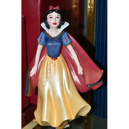 353 - FOUR BOXED ENESCO DISNEY SHOWCASE COLLECTION FIGURES, comprising Belle no 4058293, Belle Masquerade ... 