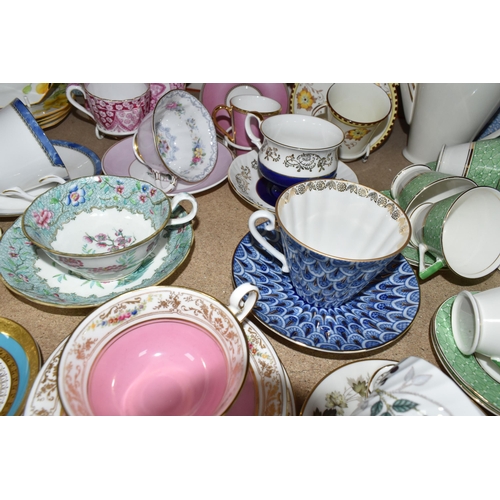 369 - A SELECTION OF DECORATIVE TEA WARES ETC, to include a pink Royal Collection Faberge trio, puce colou... 