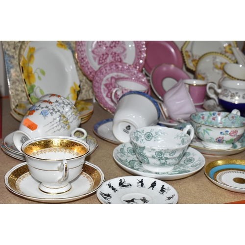 369 - A SELECTION OF DECORATIVE TEA WARES ETC, to include a pink Royal Collection Faberge trio, puce colou... 