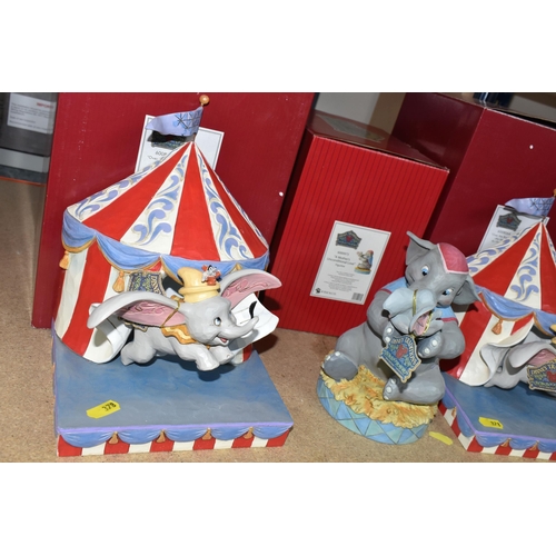 378 - THREE BOXED JIM SHORE DISNEY TRADITIONS DUMBO FIGURINES, comprising two 'Over The Big Top' 6008064 f... 