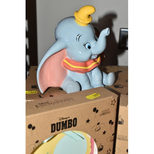 379 - TWO BOXED DISNEY ENCHANTING COLLECTION DUMBO MONEY BANKS, A29718, together with six boxed 'Dumbo' ce... 