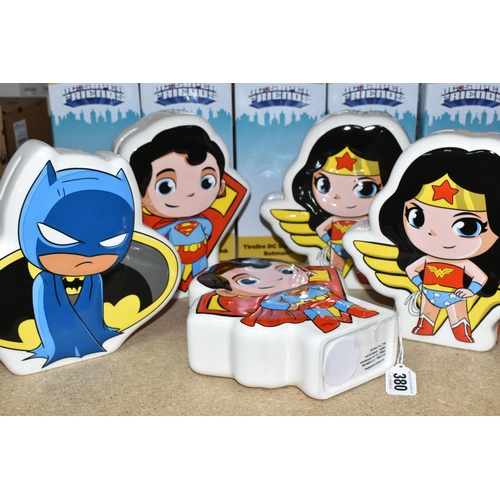 380 - FIVE BOXED D.C SUPER FRIENDS MONEY BANKS, comprising two 'Superman', two 'Wonder Woman' (one has cra... 