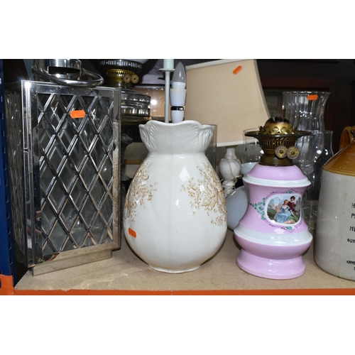 391 - A COLLECTION OF LAMPS AND LARGE CERAMIC ITEMS, to include two Duplex oil lamps, one with metal base ... 