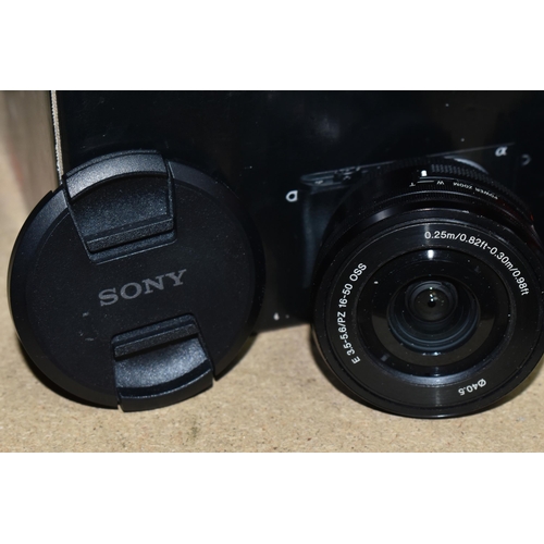 393 - A SONY ALPHA A7II DIGITAL CAMERA, fitted with a Zeiss Vario -Tessar T* f4 24-70mm lens, together wit... 