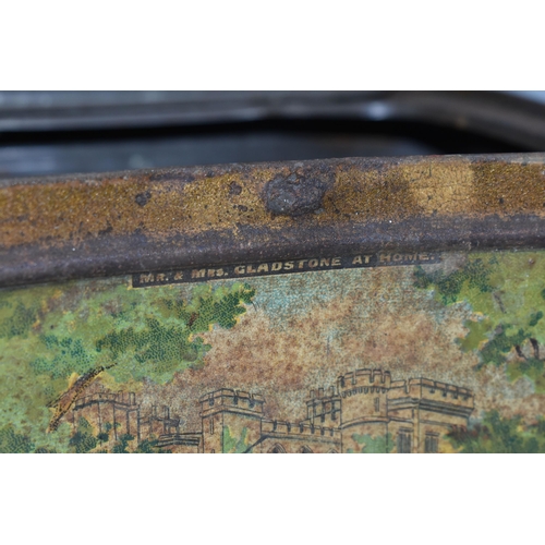 396 - A BARRINGER WALLIS & MANNERS LIMITED VICTORIAN BISCUIT TIN, its curved form decorated with political... 