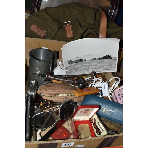 402 - TWO BOXES OF MISCELLANEOUS SUNDRIES, to include a green canvas bag, a framed photograph of a soldier... 