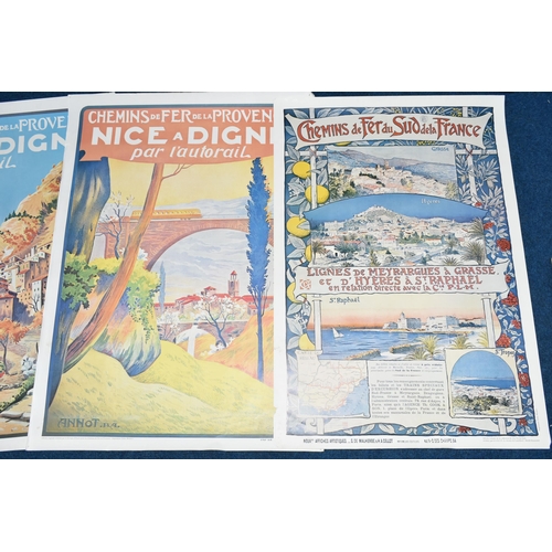 407 - A FOLDER OF POSTERS AND PRINTS, comprising two prints depicting art deco style ladies after Nelly De... 