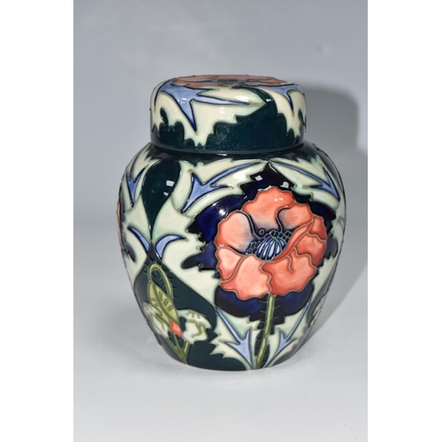 410 - A MOORCROFT POTTERY 'POPPY' PATTERN GINGER JAR AND COVER, tube lined with red poppies on a blue and ... 