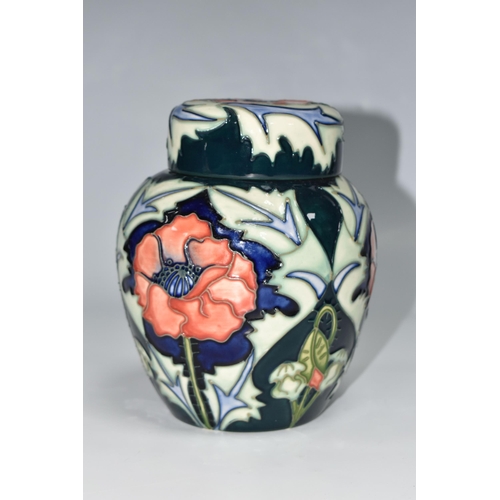 410 - A MOORCROFT POTTERY 'POPPY' PATTERN GINGER JAR AND COVER, tube lined with red poppies on a blue and ... 