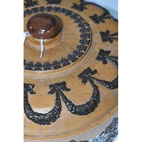 421 - A LATE NINETEENTH CENTURY DOULTON LAMBETH CHEESE DOME AND PLATE, the dome decorated with applied fol... 