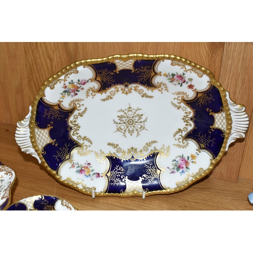 422 - TWO COALPORT DISHES, together with a cup and saucer, cobalt blue panels, Y2665 pattern inside cup, t... 