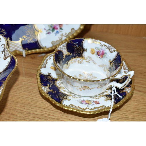 422 - TWO COALPORT DISHES, together with a cup and saucer, cobalt blue panels, Y2665 pattern inside cup, t... 