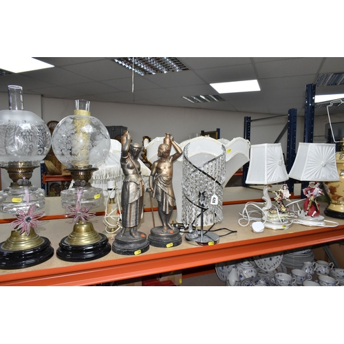 428 - A GROUP OF TABLE LAMPS, comprising two Victorian oil lamps with clear glass reservoirs, a pair of br... 