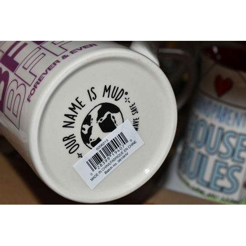 430 - SEVENTY ONE BOXED NOVELTY MUGS AND CERAMIC MONEY BANKS, twelve boxed 'Our Name Is Mud' mugs comprisi... 