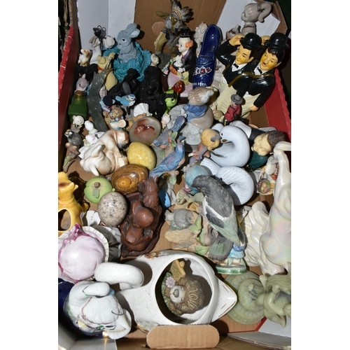 432 - EIGHT BOXES OF CERAMICS AND ORNAMENTS, to include four stone 'egg' ornaments, two vintage Hummel fig... 