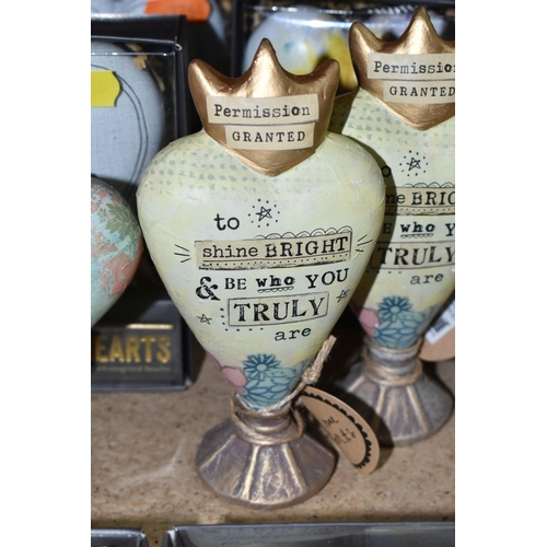 438 - A SELECTION HEART SHAPED ORNAMENTS AND MOTTO WALL PLAQUES, by Kelly Rae Roberts and others, comprisi... 