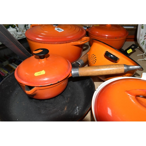 447 - A SMALL GROUP OF ORANGE CAST IRON COOKWARES ETC, comprising a Le Creuset 24cm casserole dish, two un... 